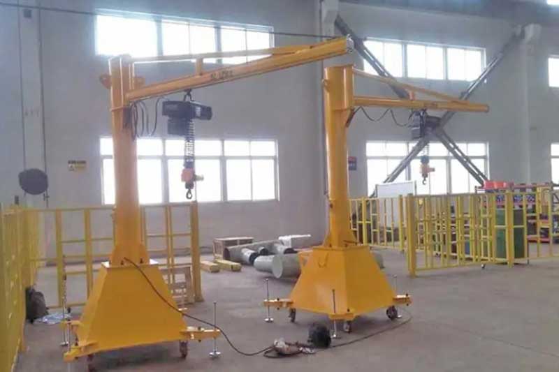 Floor-mounted portable jib cranes