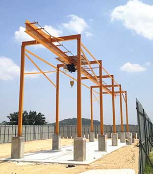  Fixed gantry crane with monorail hoists 